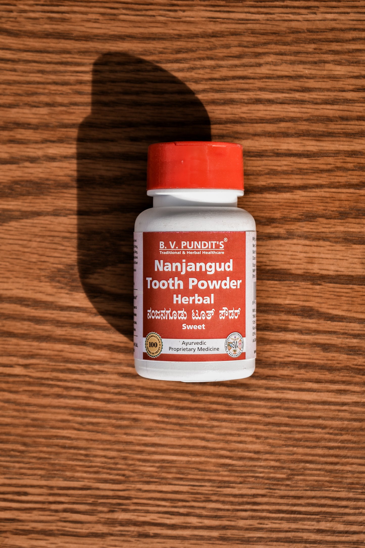 BV Pundit's Nanjangud Tooth Powder 75g, Sweet, Ayurvedic Ayush certified toothpowder that is 100% natural, safe for kids and adults. Contains no artificial chemicals or flavours, no fluoride, no preservatives. Organic and herbal tooth powder with the goodness of charcoal, clove, peppermint, menthol and eucalyptus